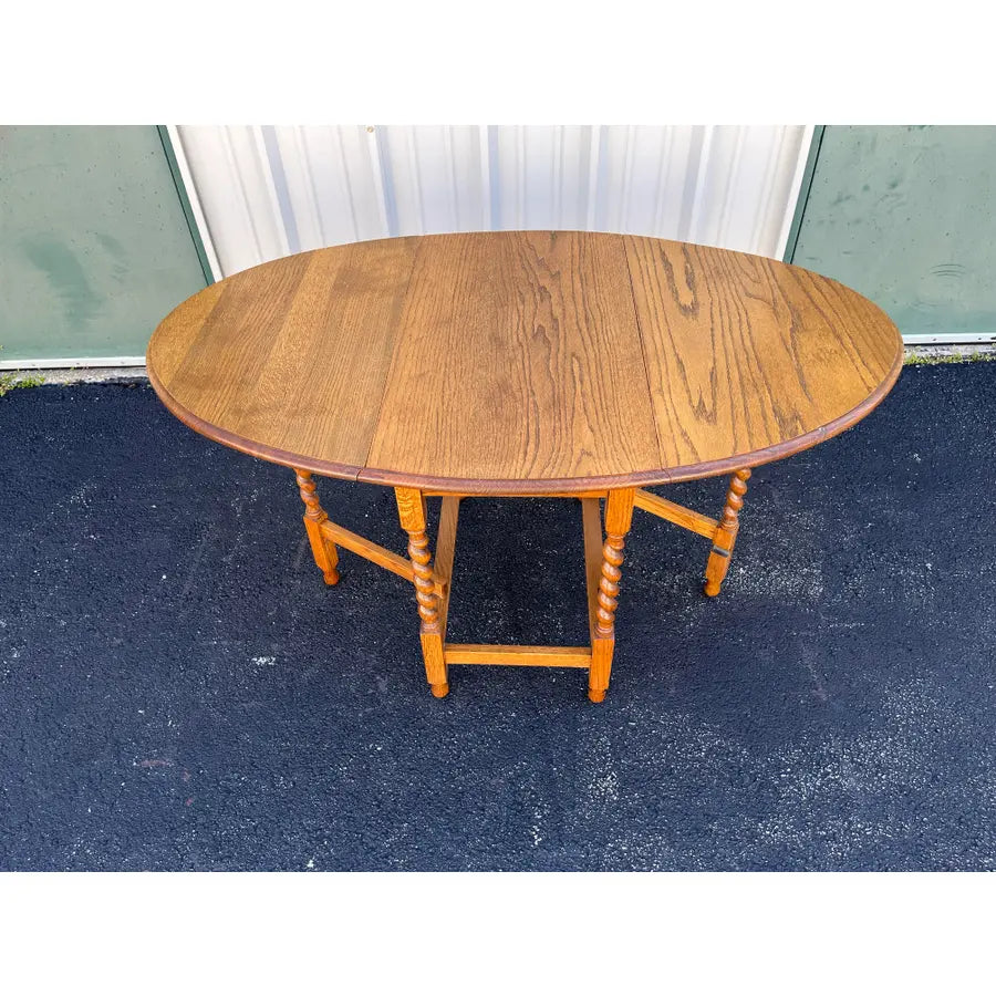 Early 1900's English Oak Barley Twist Oval Gate Leg Table