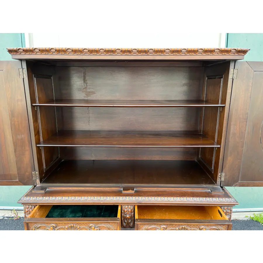 1910s Revell & Co Jacobean Carved Walnut Dining Cabinet