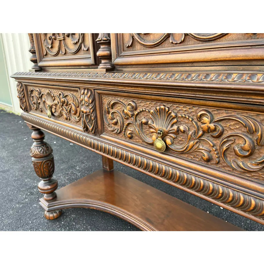 1910s Revell & Co Jacobean Carved Walnut Dining Cabinet