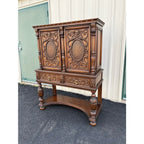 1910s Revell & Co Jacobean Carved Walnut Dining Cabinet