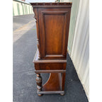 1910s Revell & Co Jacobean Carved Walnut Dining Cabinet