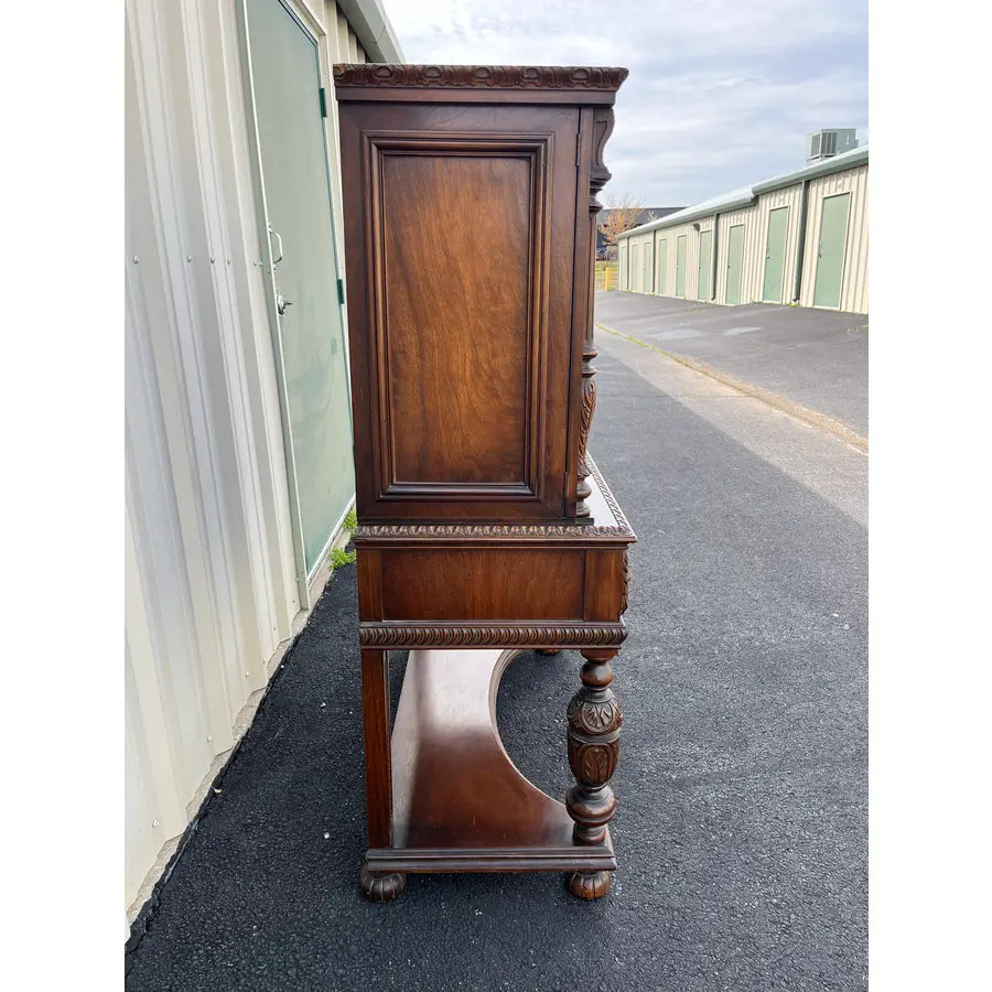 1910s Revell & Co Jacobean Carved Walnut Dining Cabinet