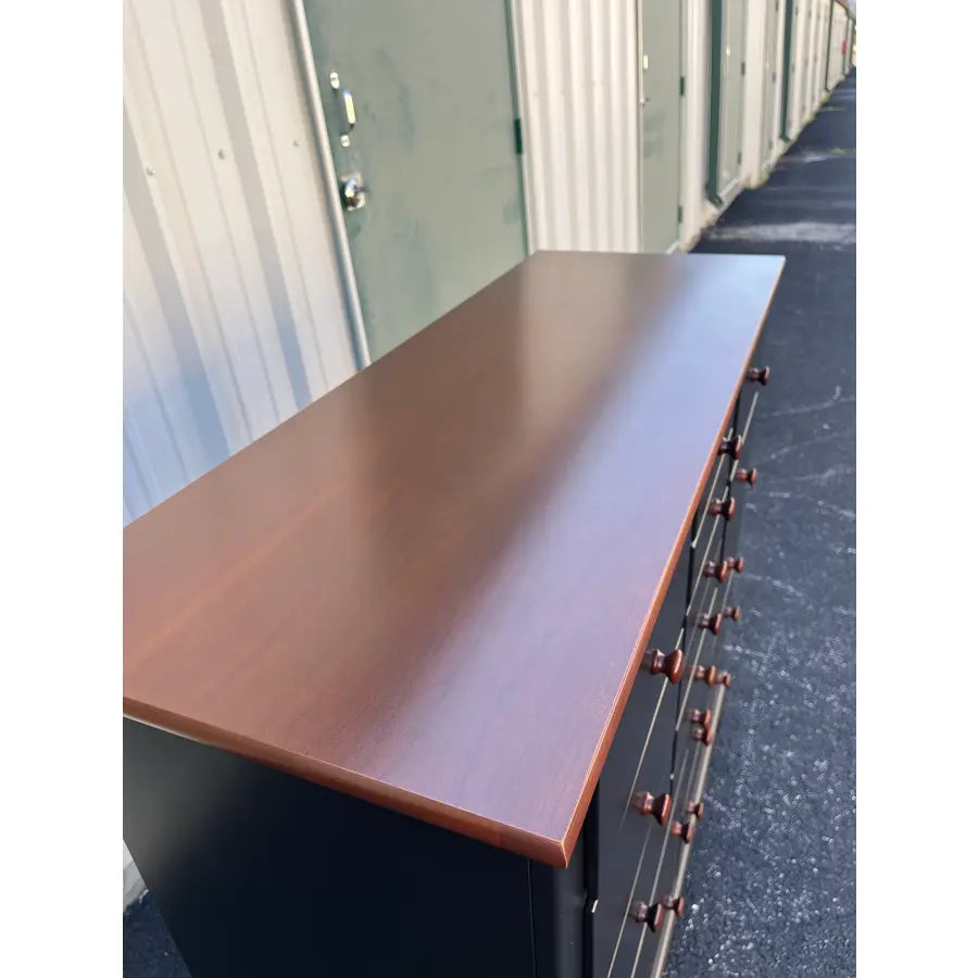 1990's Stanley Furniture 13-Drawer Black and Cherry Tall Chest of Drawers With Dressing Mirror