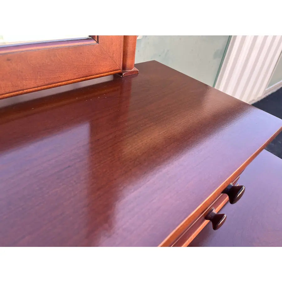 1990's Stanley Furniture 13-Drawer Black and Cherry Tall Chest of Drawers With Dressing Mirror