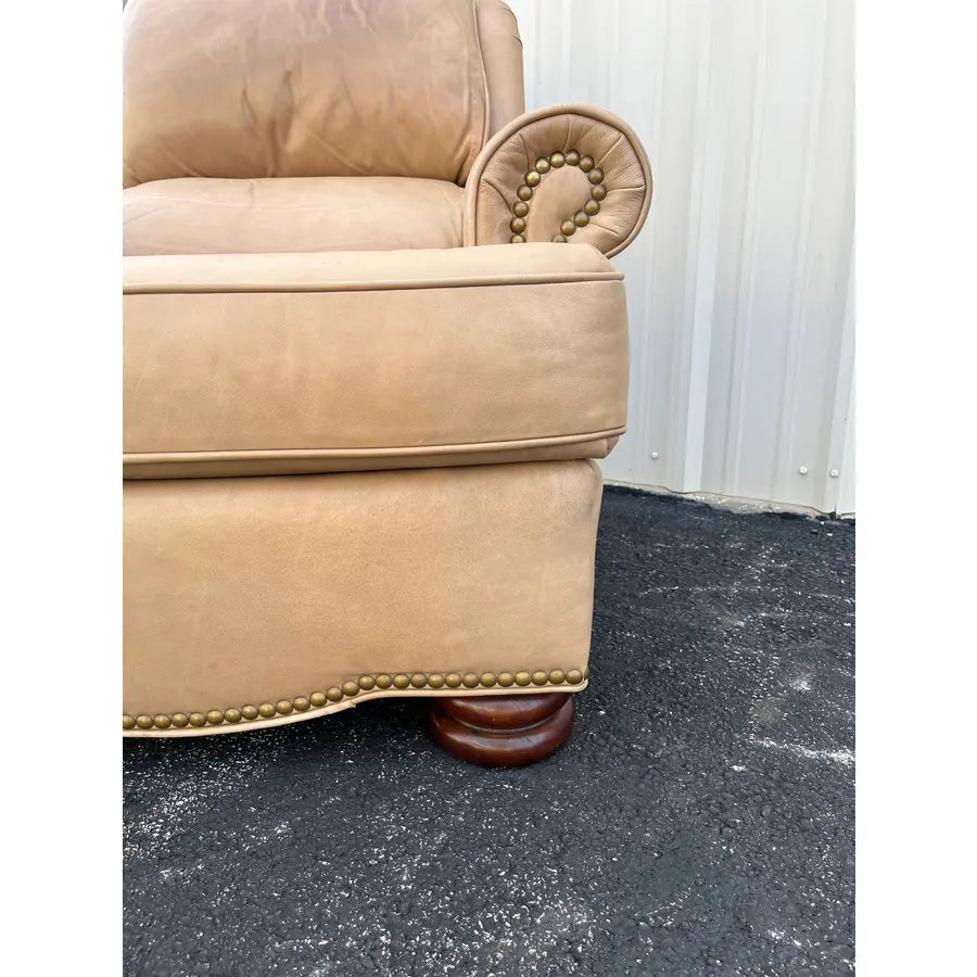 A Pair of Bradington Young Leather Recliners and Ottomans- 1990's