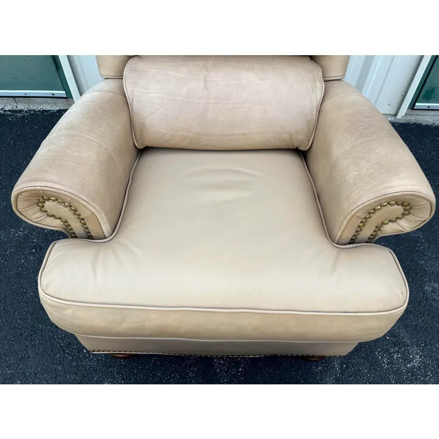 A Pair of Bradington Young Leather Recliners and Ottomans- 1990's