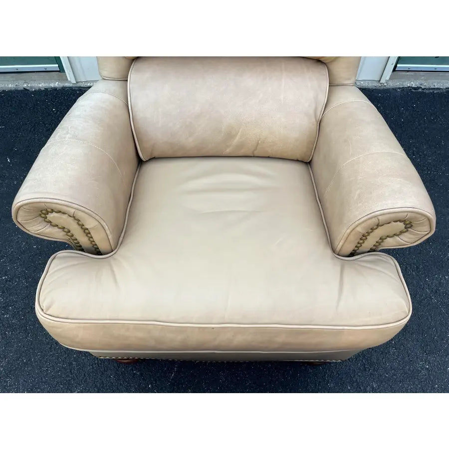 A Pair of Bradington Young Leather Recliners and Ottomans- 1990's