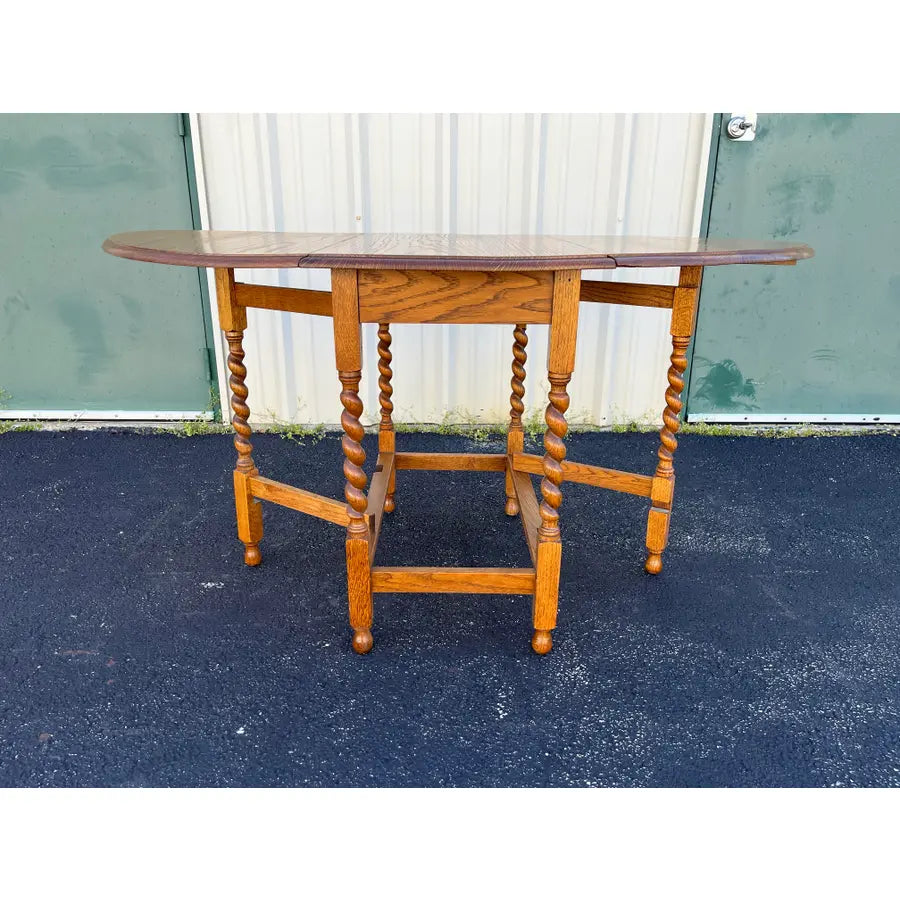 Early 1900's English Oak Barley Twist Oval Gate Leg Table