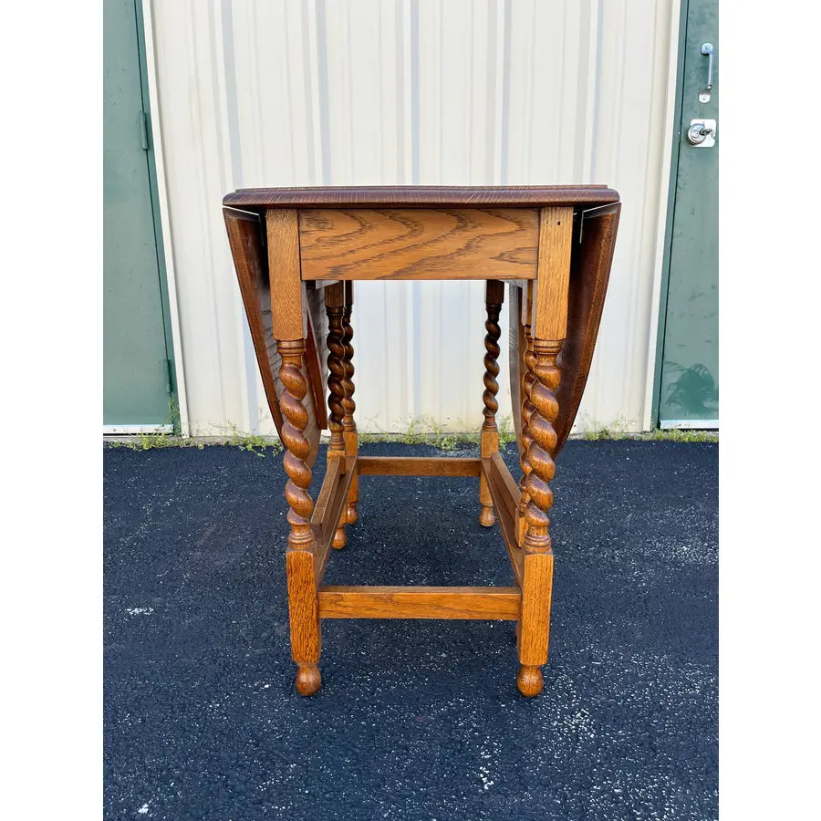 Early 1900's English Oak Barley Twist Oval Gate Leg Table