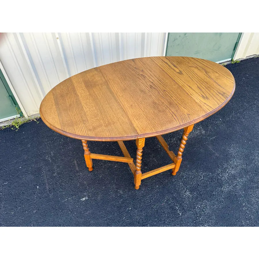 Early 1900's English Oak Barley Twist Oval Gate Leg Table