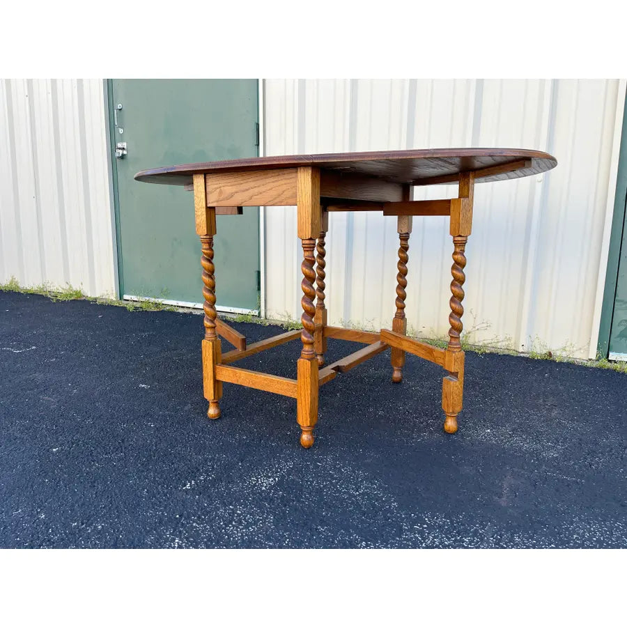 Early 1900's English Oak Barley Twist Oval Gate Leg Table
