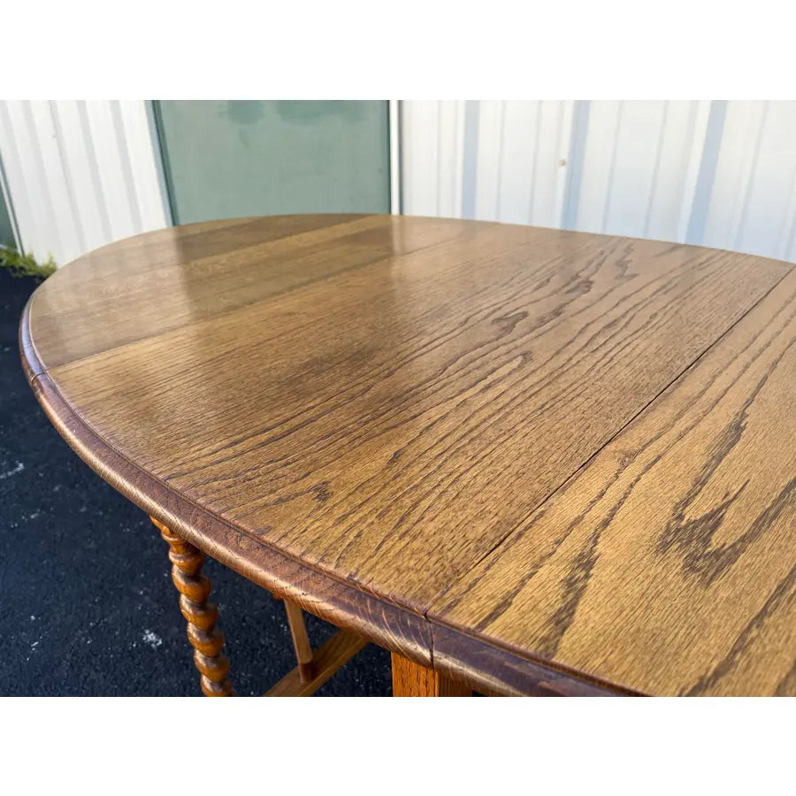 Early 1900's English Oak Barley Twist Oval Gate Leg Table