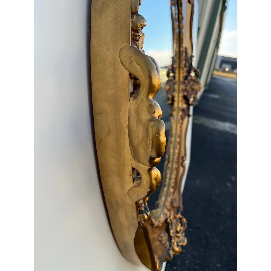 J.A. Olson Beveled Glass Oval Mirror in Gilded Frame