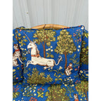 Mid 20th Century Asian Rattan Loveseat With Unicorn Tapestry Upholstery
